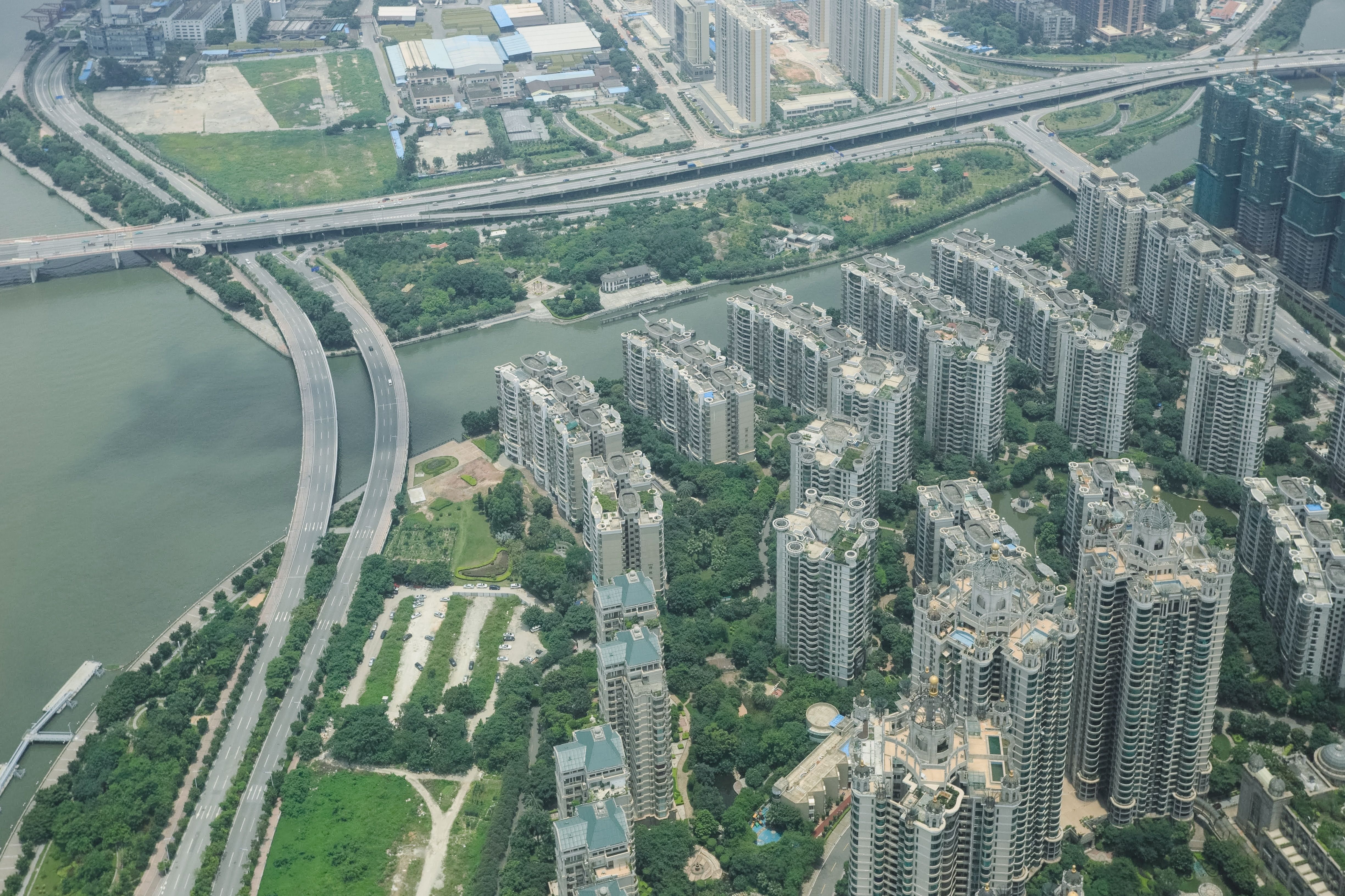 Aerial View of Skyscrapers and Streets in a Modern City · Free Stock Photo