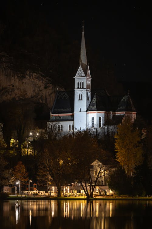 Free St. Martina Parish Church in Bled Slovenia at Night Stock Photo