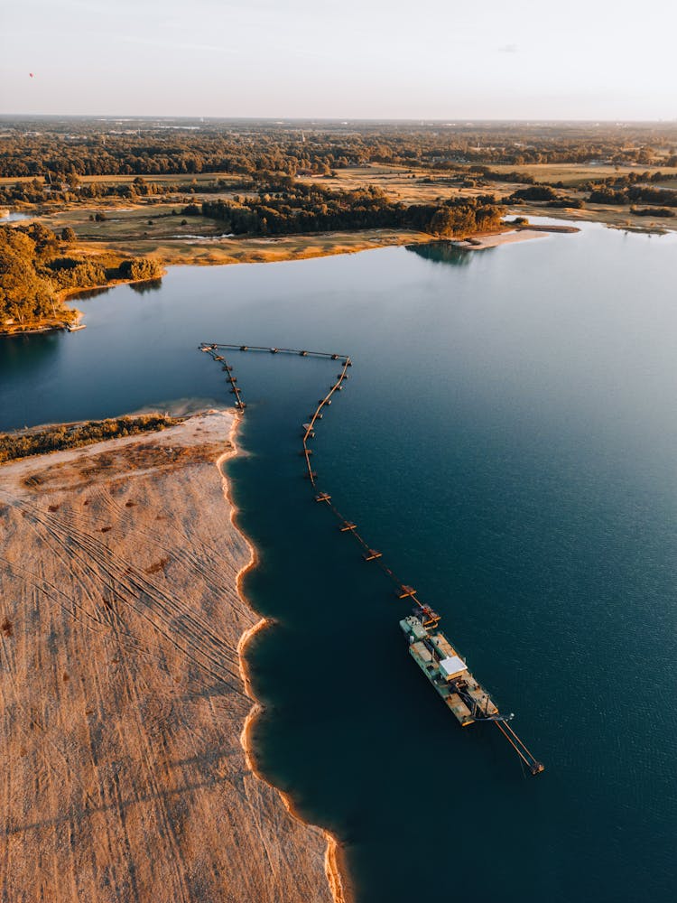 Aerial View Of Dredge Barge On The River