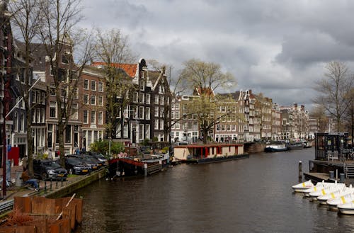 Ingyenes stockfotó Amszterdam, csatorna, csónakok témában
