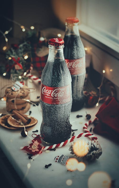 Безкоштовне стокове фото на тему «Coca-Cola, вертикальні постріл, Вибірковий фокус»