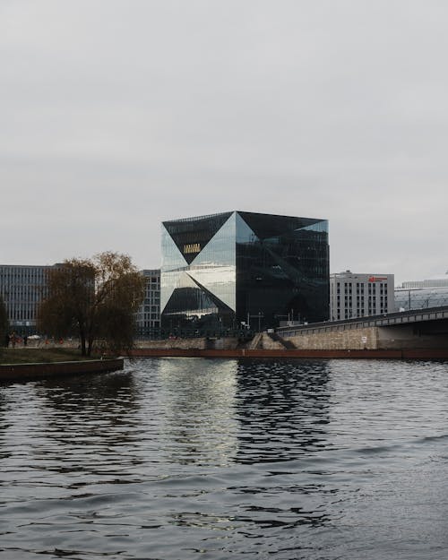 Free Cube Berlin over Spree River Stock Photo