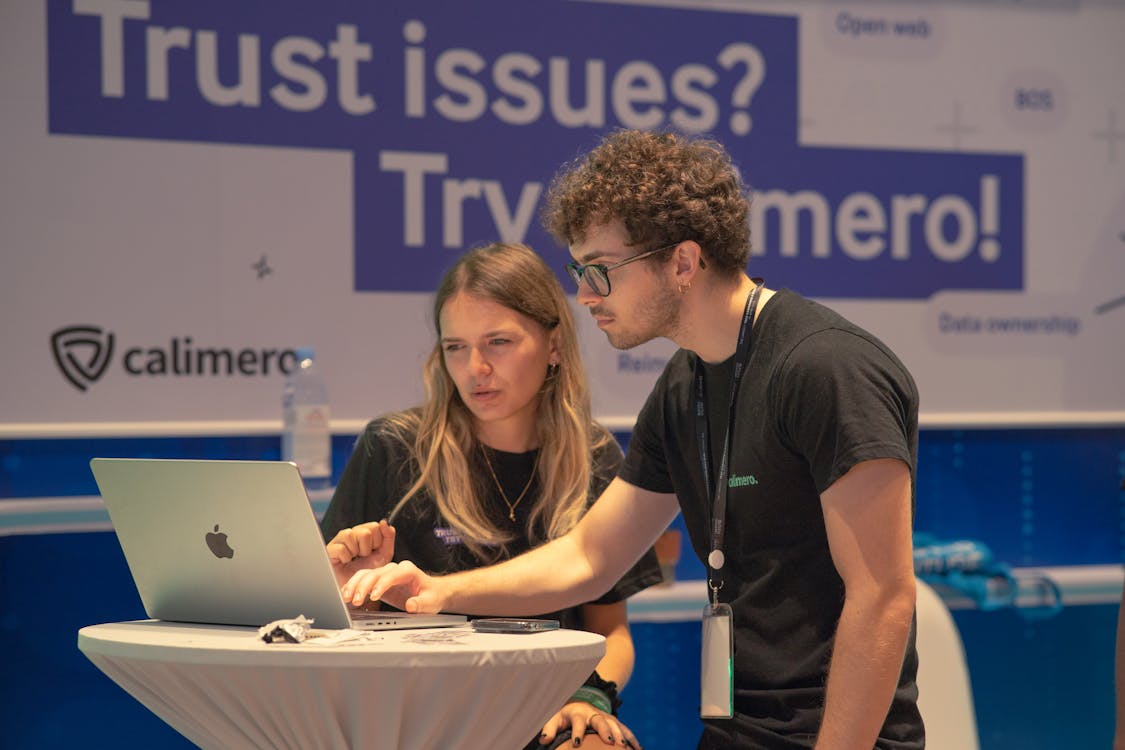 Free Woman and Man at Job Fair Stock Photo