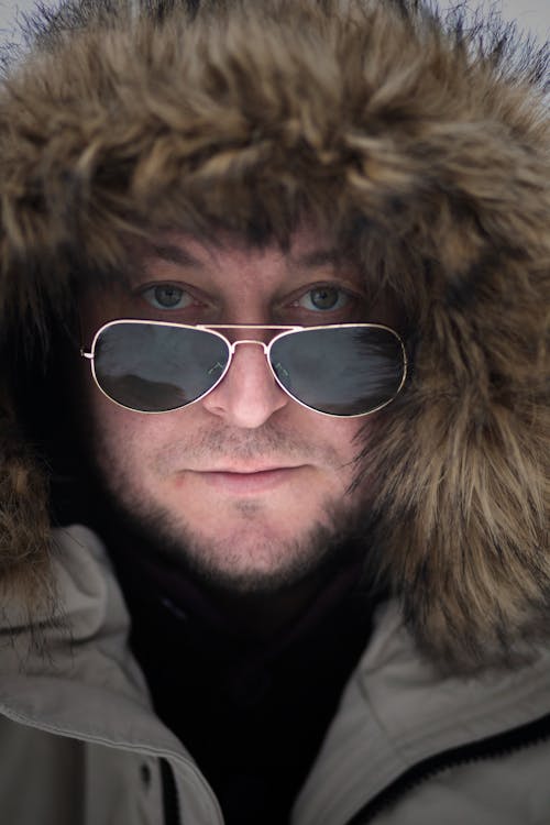 Portrait of a Man in Fur Hooded Coat