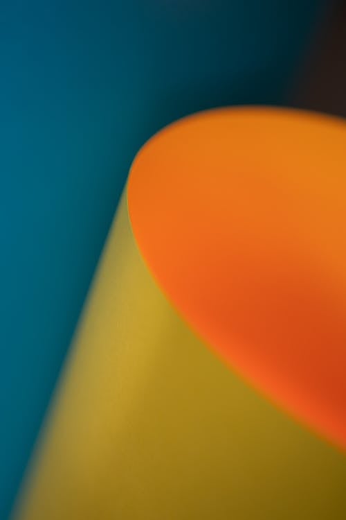 Close-up of a Yellow Object on Blue Background 