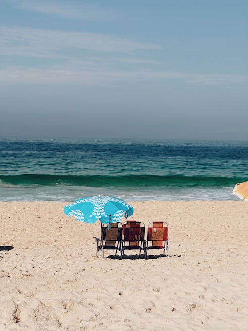 Sunbeds on a Sunny Beach 