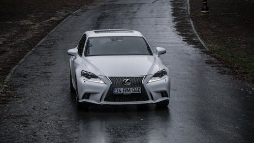 View of a Lexus IS on a Wet Road