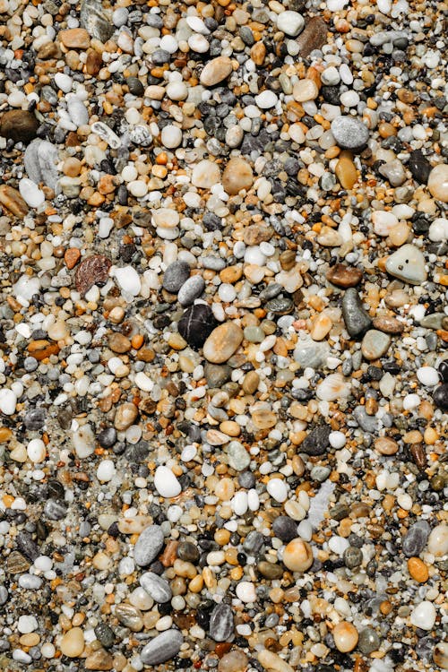 A close up of a beach with pebbles