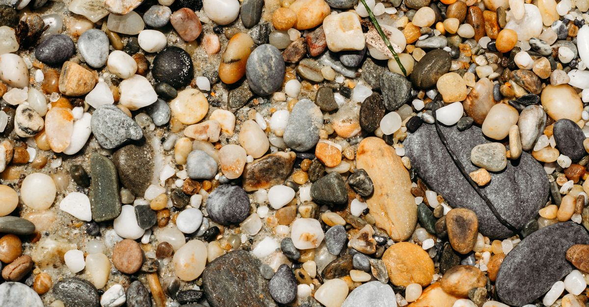 Peddles Rocks A close up of rocks and pebbles on the beach · Free Stock Photo