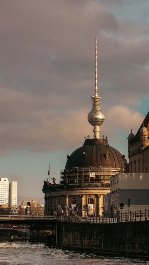 Free Scenic view of Berlin's Bode Museum and Fernsehturm against an urban skyline. Stock Photo