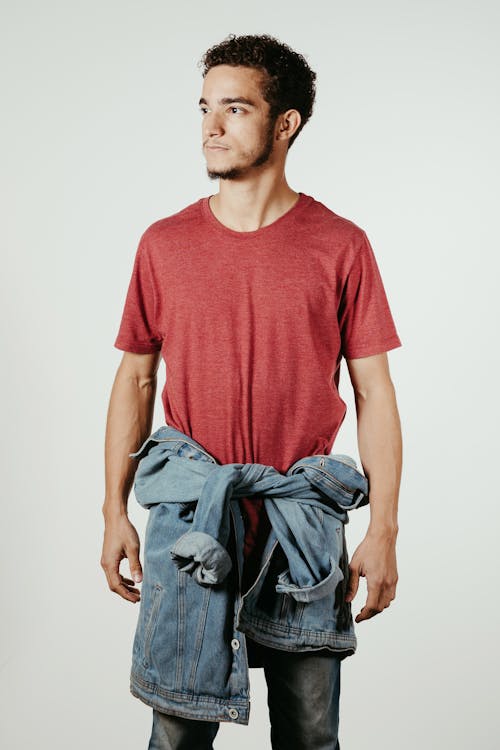 Man Posing in a Pink T-Shirt