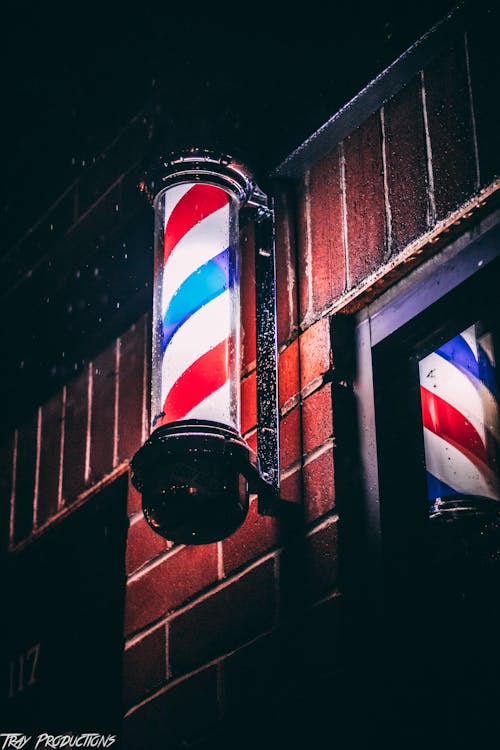 Free stock photo of barber pole, blue, brick wall