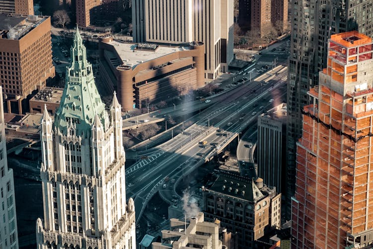 Aerial View Photo Of Highways Beside Buildings