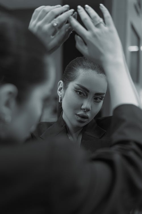 Model Posing in Makeup in Black and White