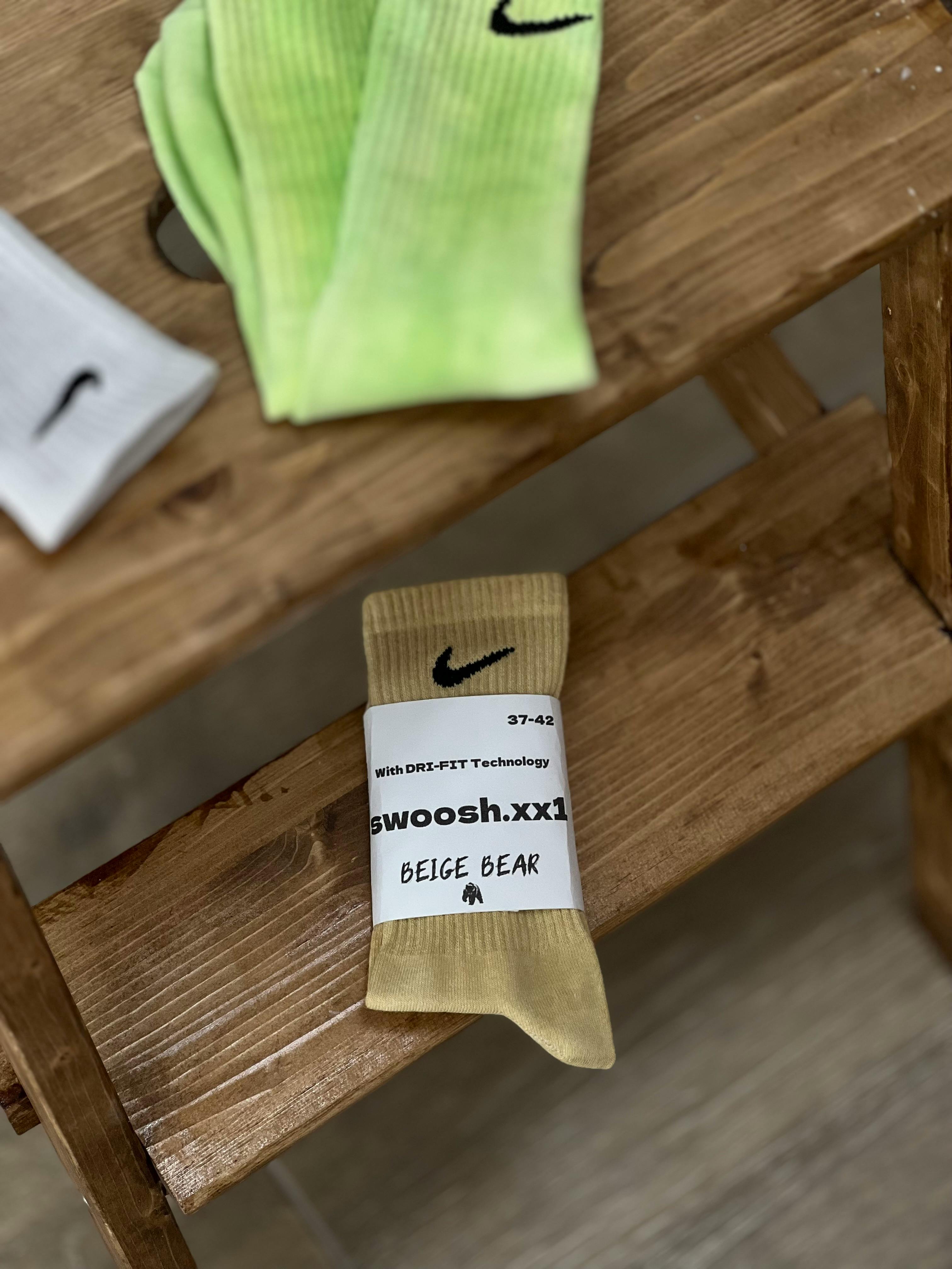 Close-up of loose fitting cotton socks on feet