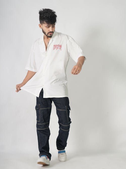 Model Walking in White Shirt