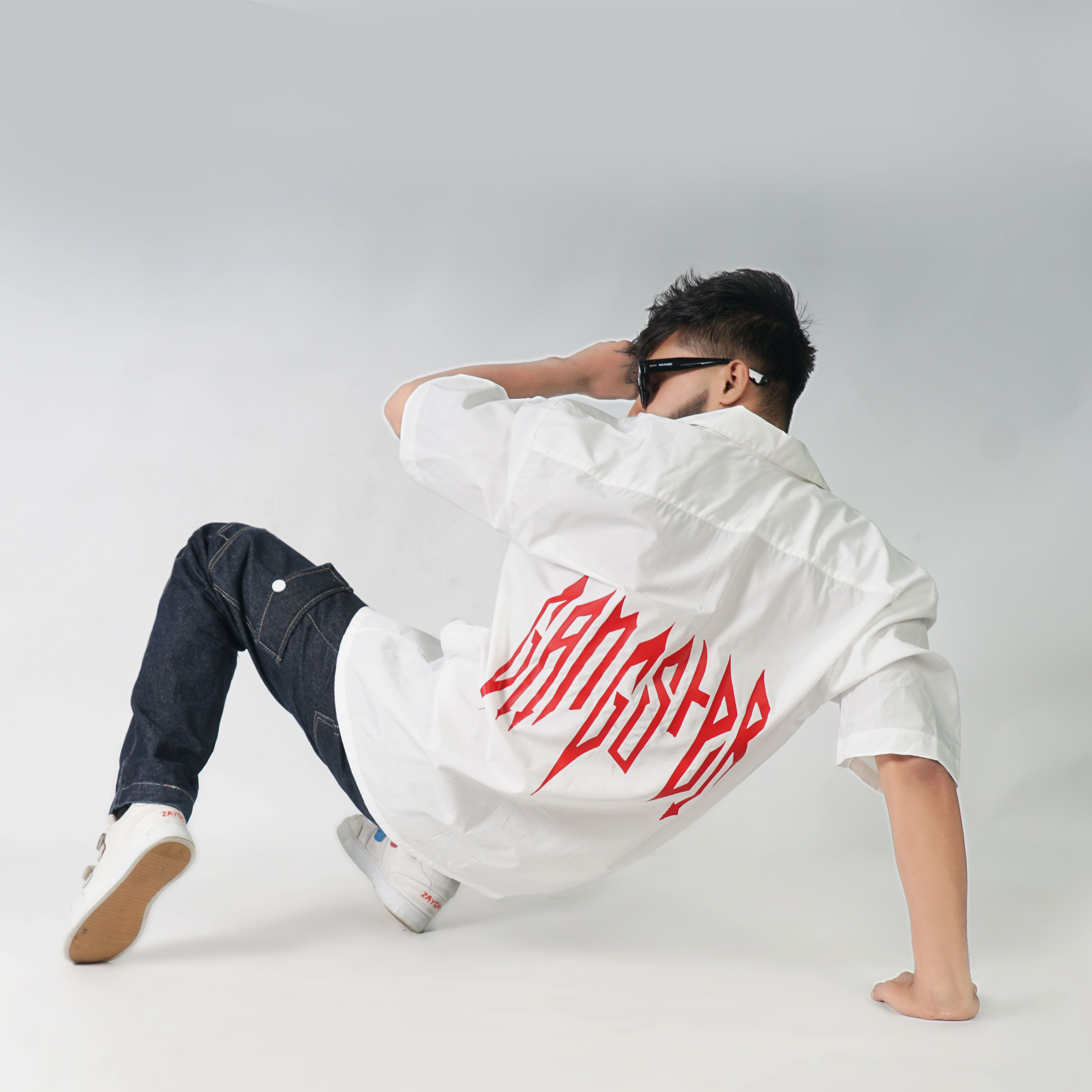 Man in White Shirt Posing on White Background