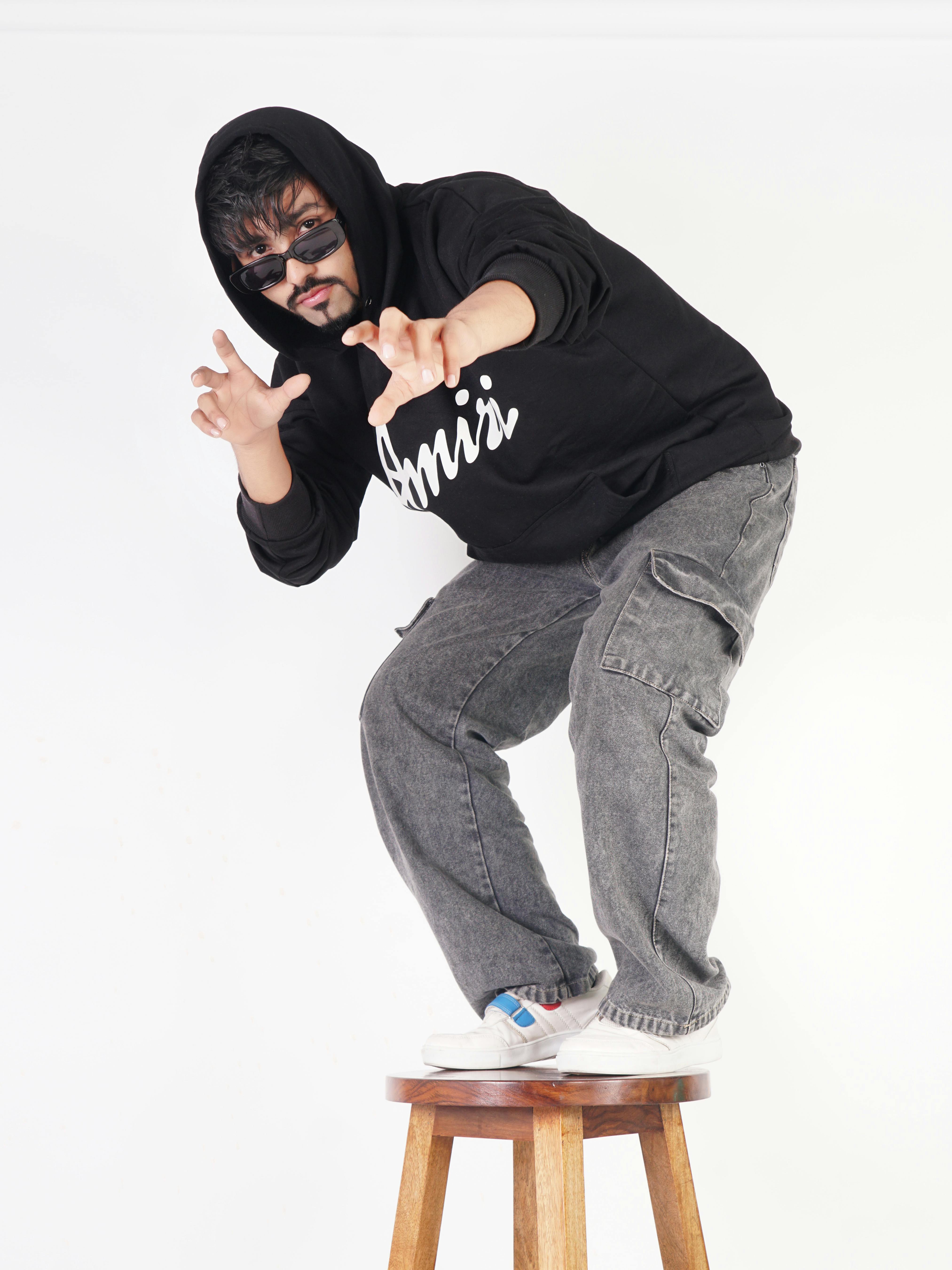Black Script Hoodie Gray Cargo Jeans White Sneakers