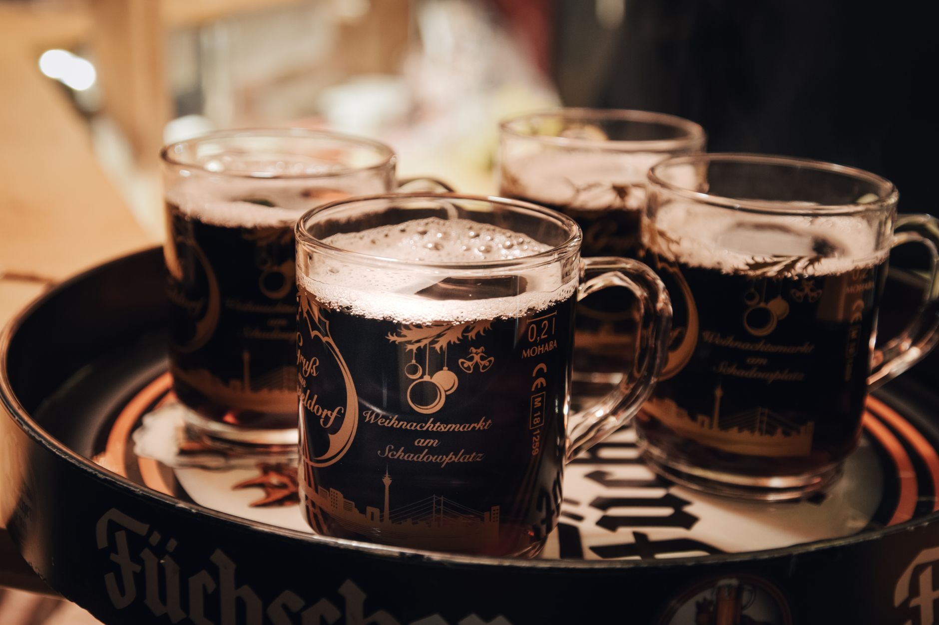 Warm mulled wine served at the Düsseldorf Christmas market, capturing festive cheer.