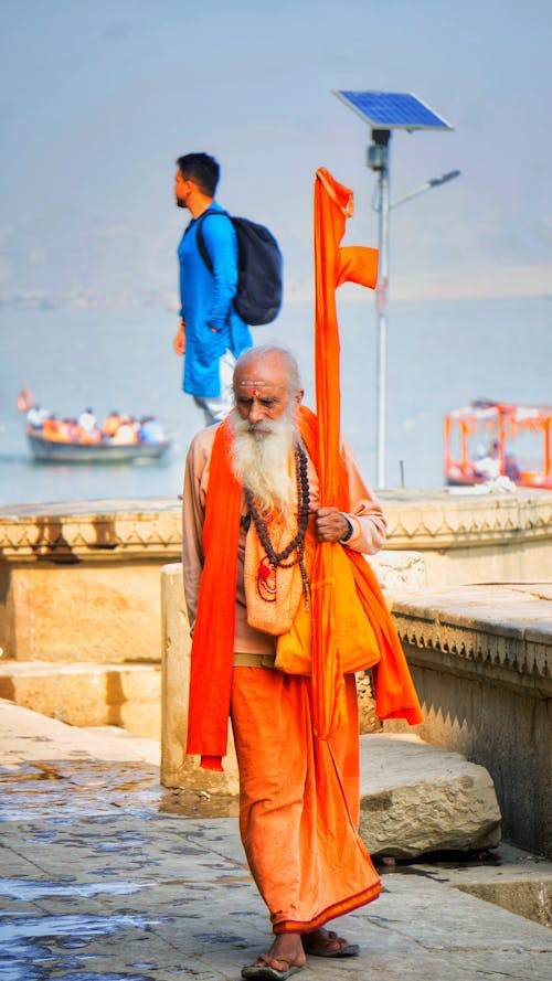 Elderly Monk with Beard and in Orange Robes