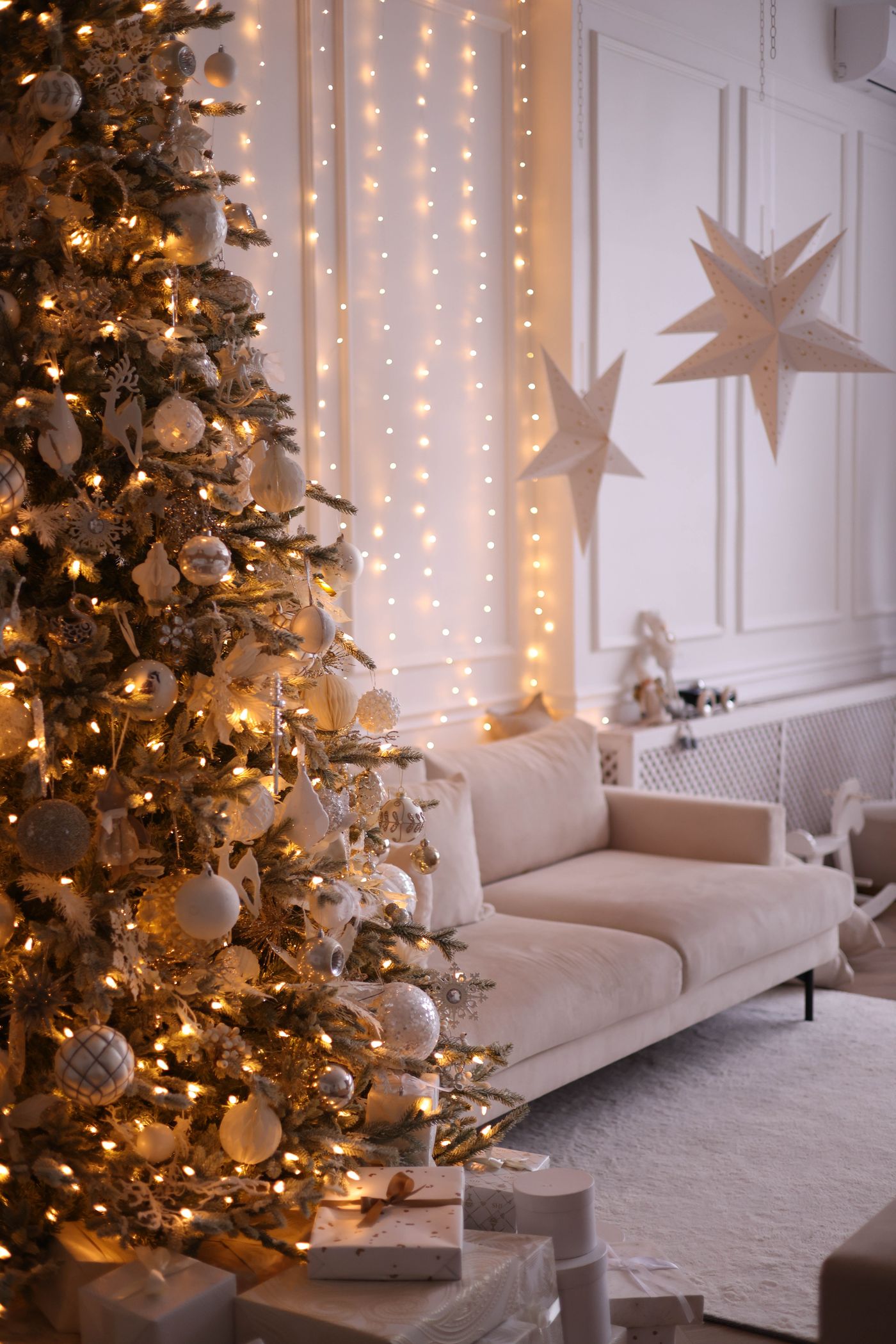 Elegant Christmas tree in a bright living room