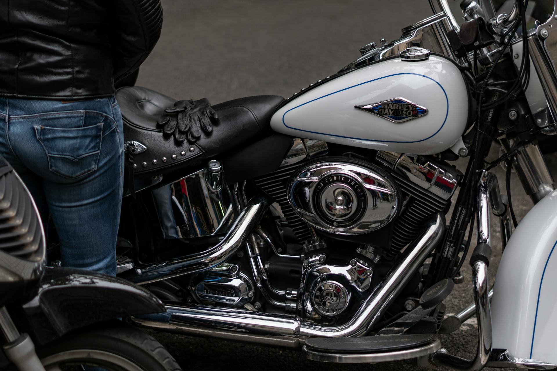 A detailed view of a Harley Davidson motorcycle parked outdoors in Barcelona.