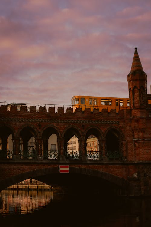 Train on Oberbaumbrucke in Berlin at Dusk