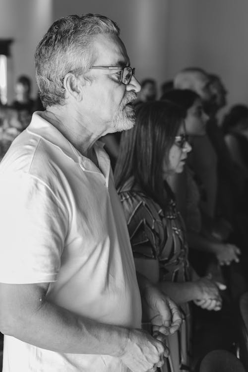 Portrait of Elderly People in Church in Black and White 