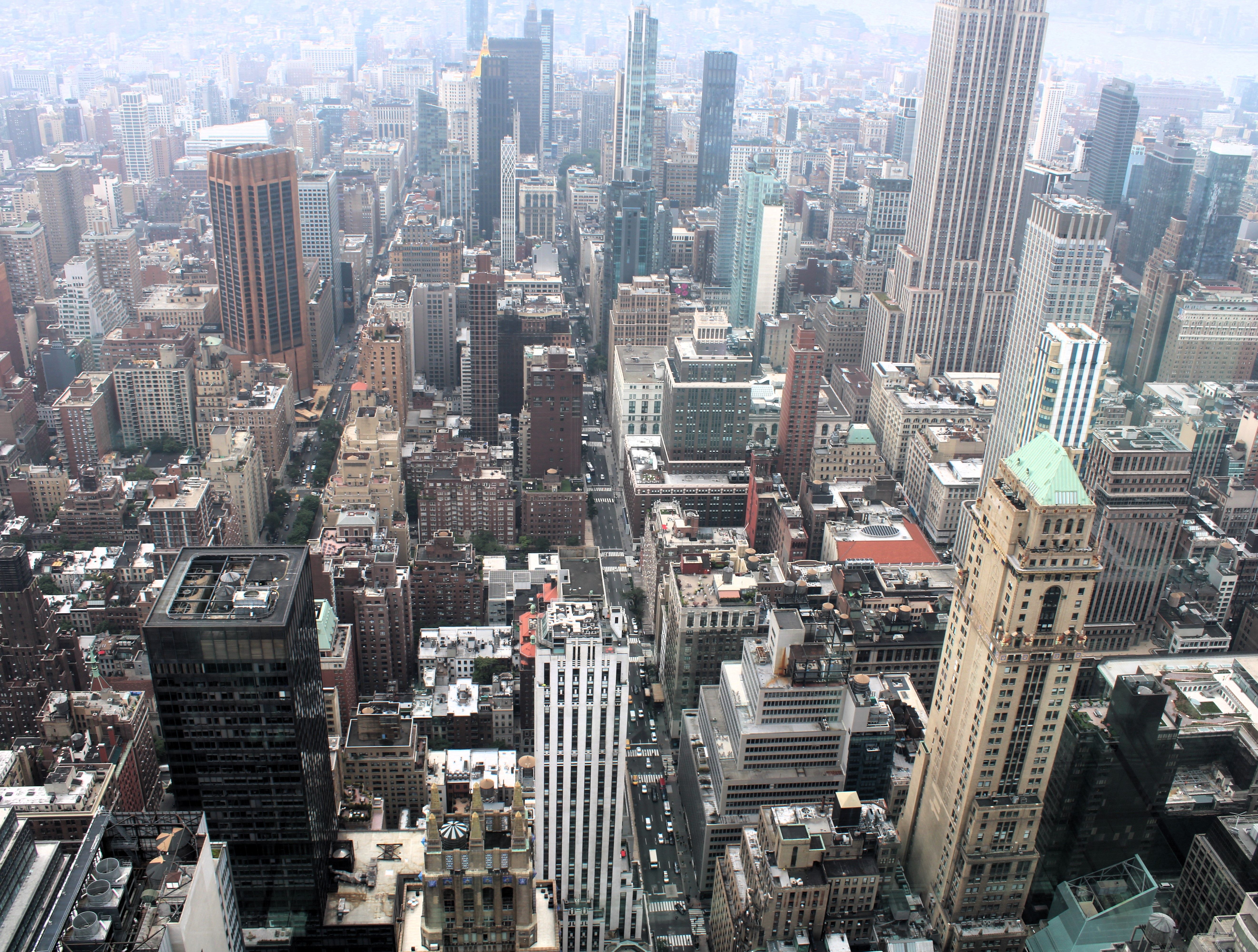 Aerial panorama of New York City's iconic skyscrapers and urban landscape.