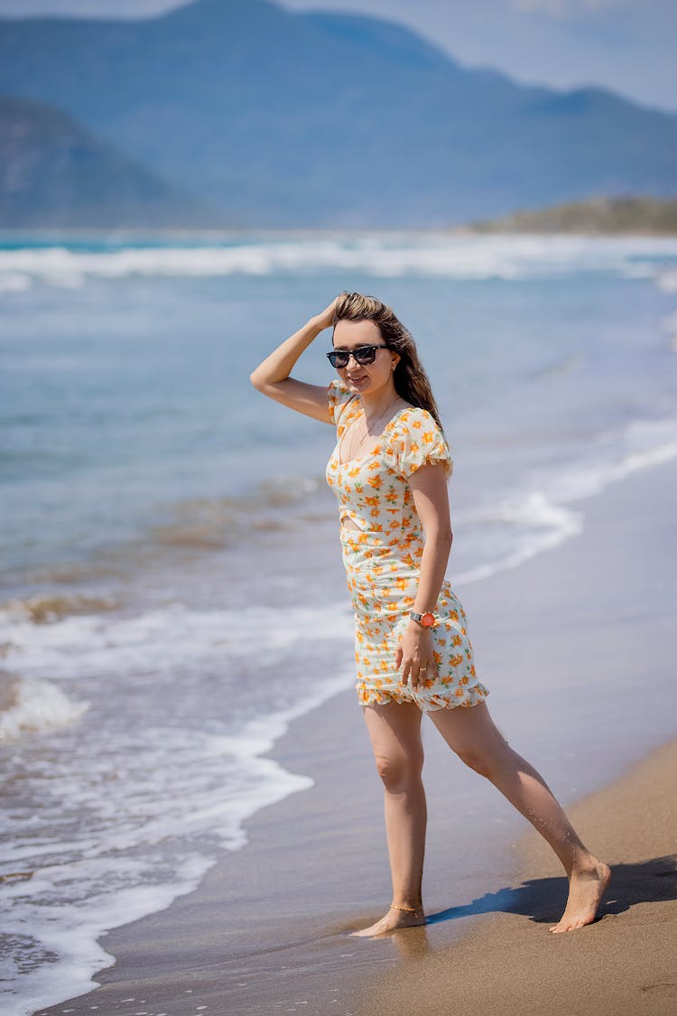 Woman On A Sunny Beach 