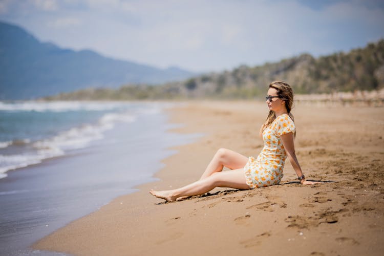 Woman On A Sunny Beach 