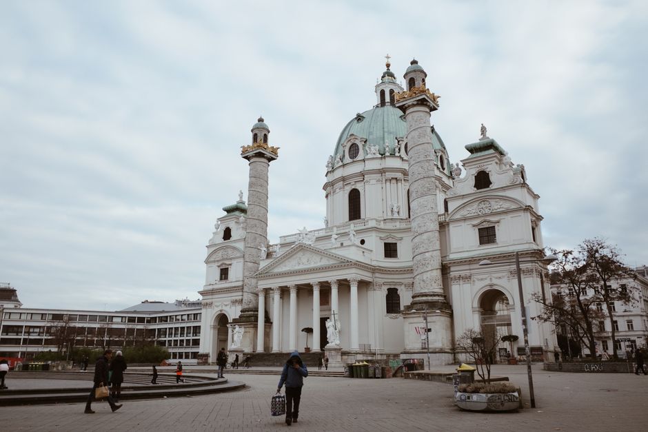 People using free Wi-Fi in a public square in Vienna, Austria