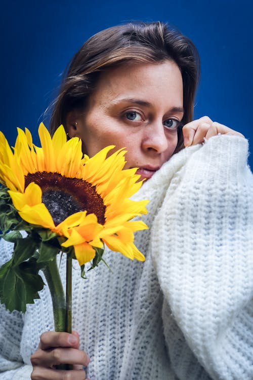 Woman Holding Sunflower