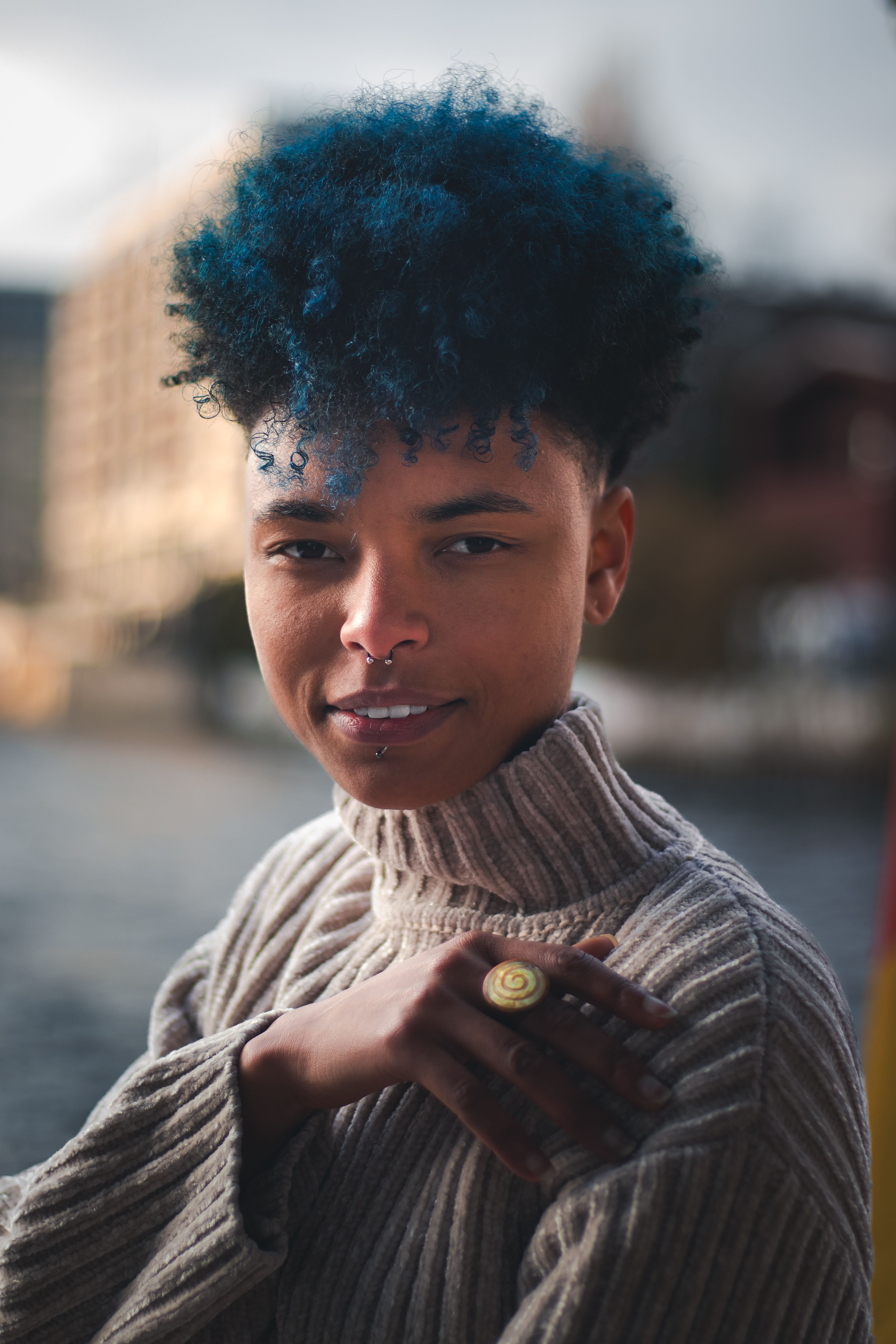 A Woman with Blue Afro Hair · Free Stock Photo