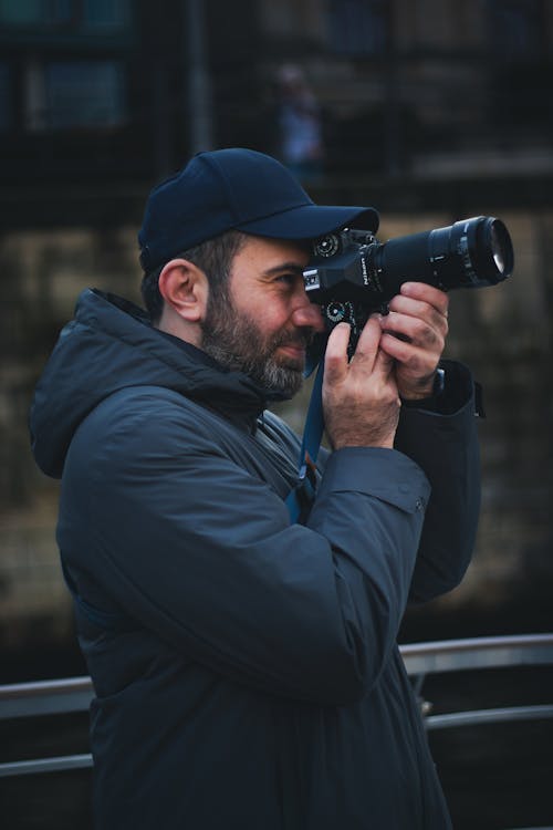 Gratis arkivbilde med fotograf, hatt, jakke