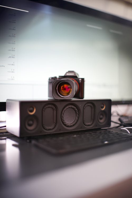 Camera and Accessories on Desk