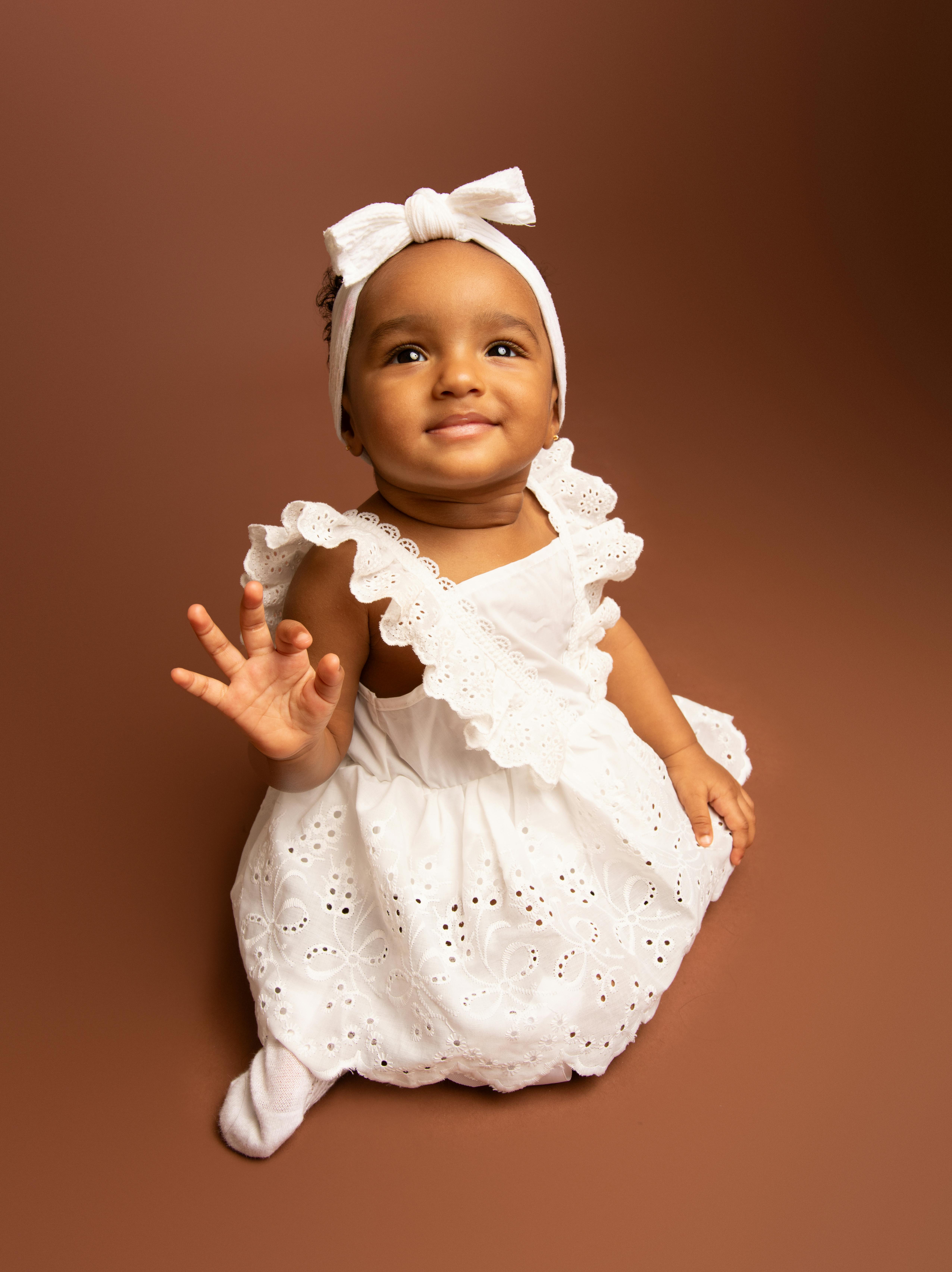 Cute baby clearance in white dress