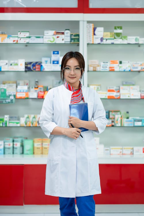 Young Pharmacist in Drugstore