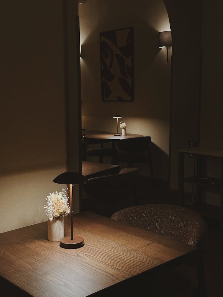 Lamps On Tables In Restaurant