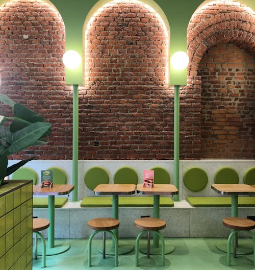 A modern, colorful restaurant with vibrant decor and a lively atmosphere
