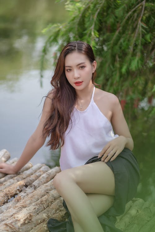 Brunette Woman Posing by the Lake