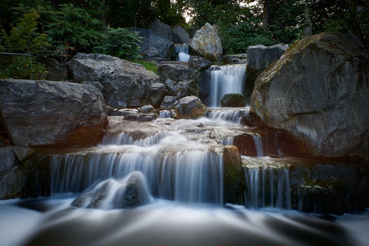 Waterfalls On Stream In Forest