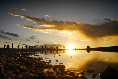 Kostnadsfri bild av gyllene solnedgång, solnedgång människor, solnedgångstranden