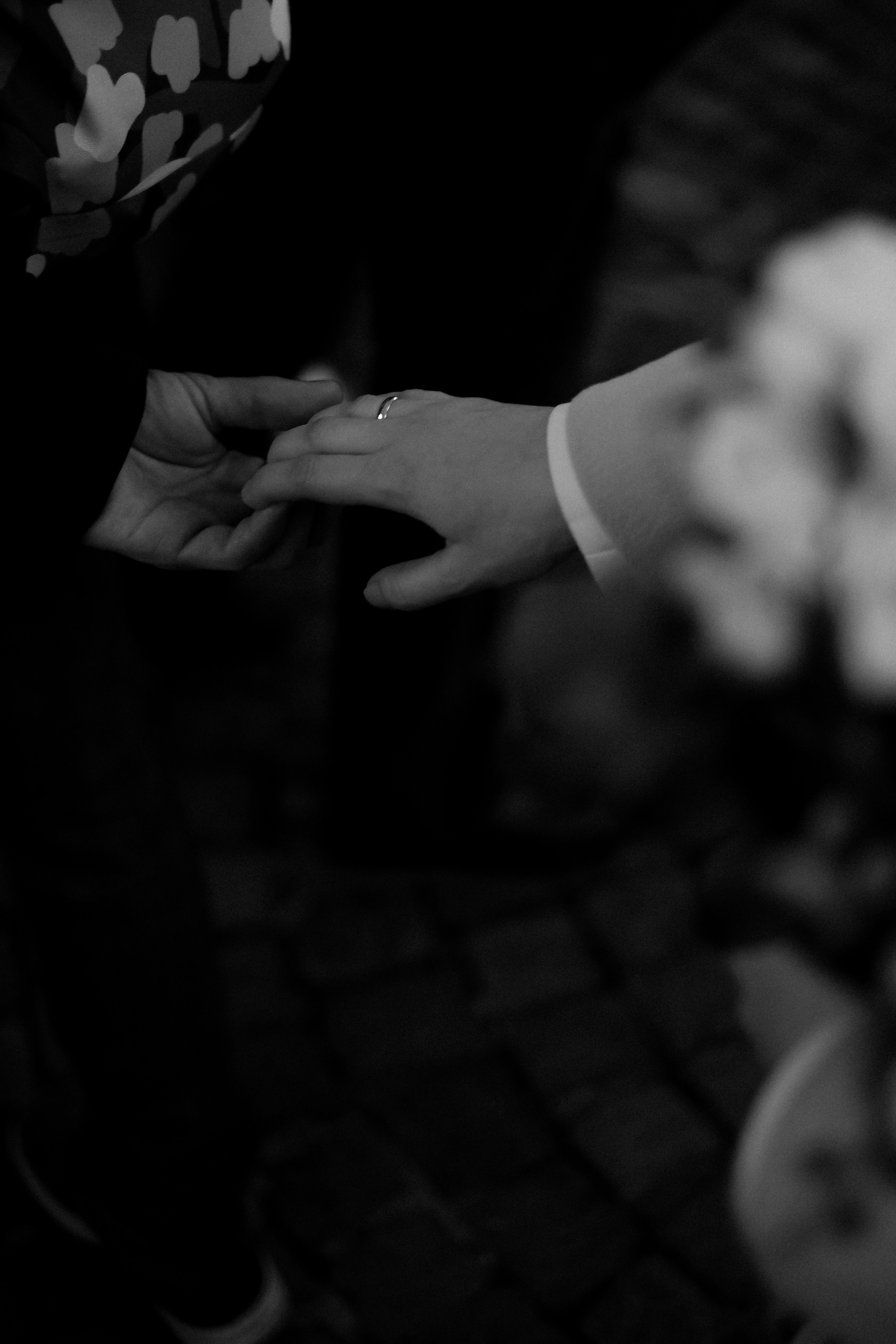 Black and White Photo of a Couple Holding Hands · Free Stock Photo