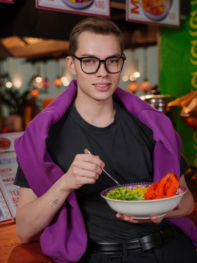 Portrait Of Man With Food Bowl