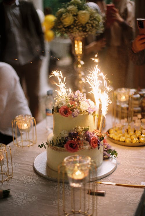 Free A wedding cake with sparklers on top Stock Photo