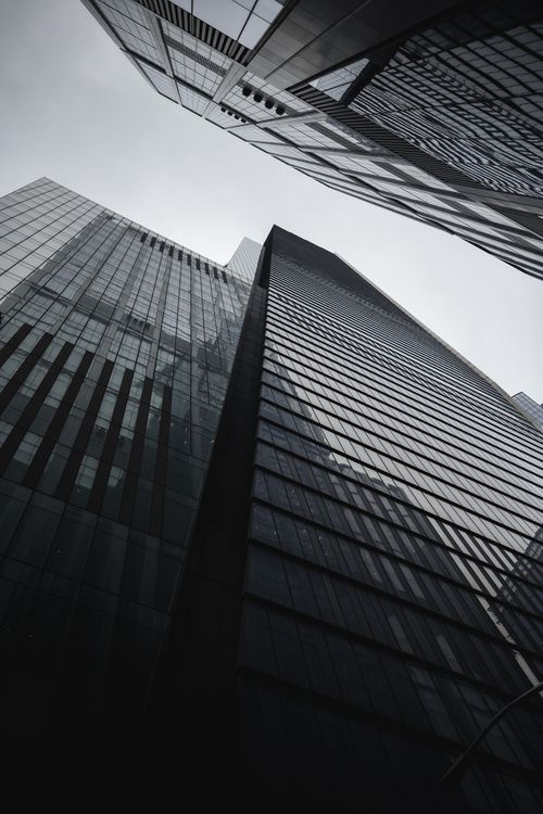 Free Low angle view of modern skyscrapers in New York City, showcasing urban architecture. Stock Photo