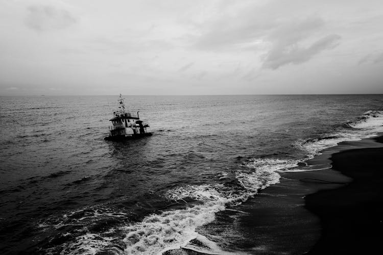 Boat And Waves In Black And White 