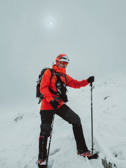Man Hiking in Mountains in Winter 