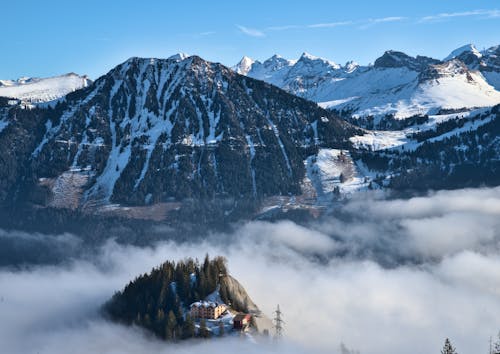 Clouds over Hills in Mountains in Winter